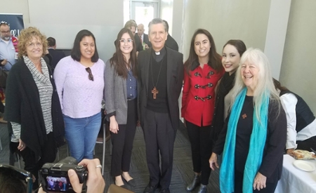 Archbishop and UIW community members