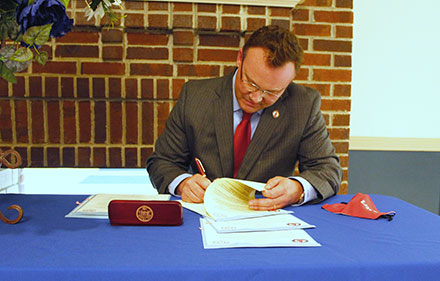 UIW President Dr. Thomas M. Evans signs Memorandums of Understanding