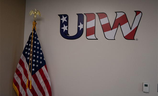 UIW logo and flag