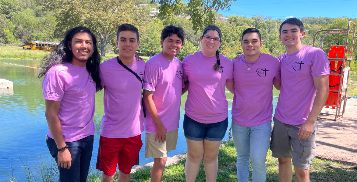 Six students smile together at Salve Retreat