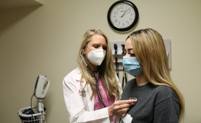 Dr. Ronda Gottlieb checks on a patient