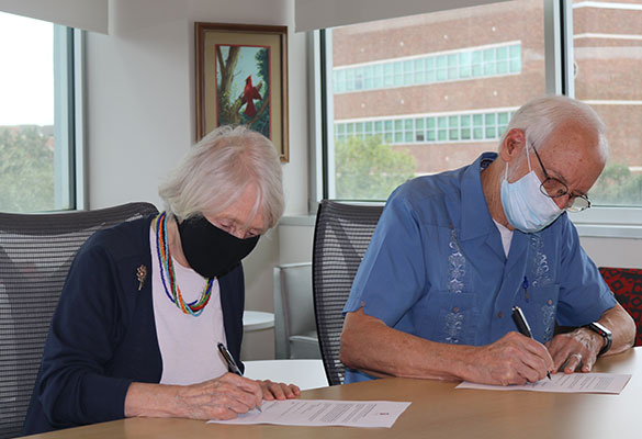 Donors signing paperwork
