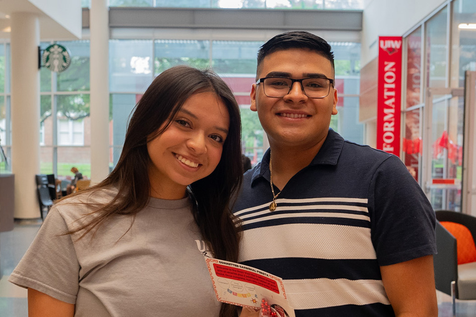 Two students in the Welcome Center