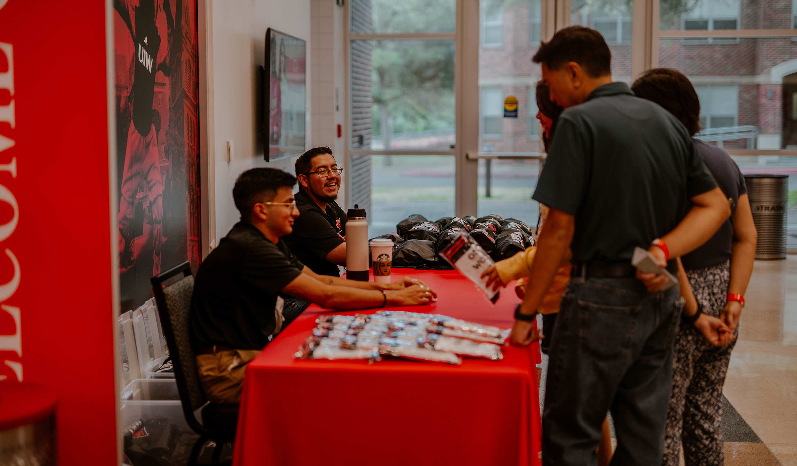 Counselors talking with students