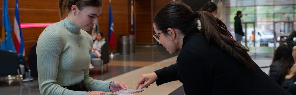 student speaking to counselor in SEC