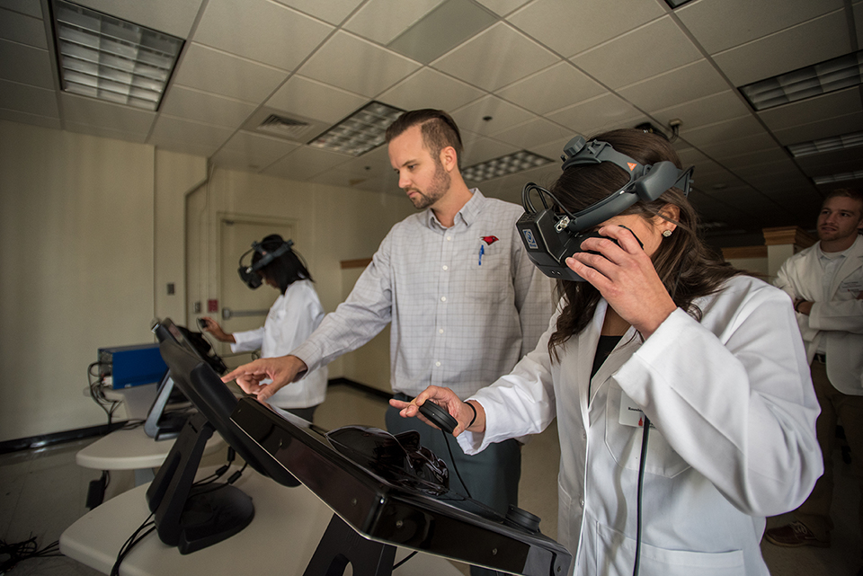 Optometry students in the eye lab