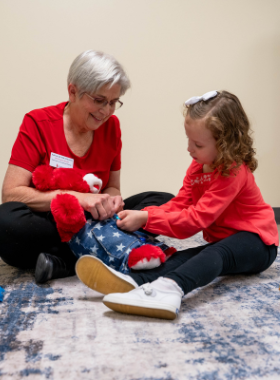 Physical Therapy students interacting with tools