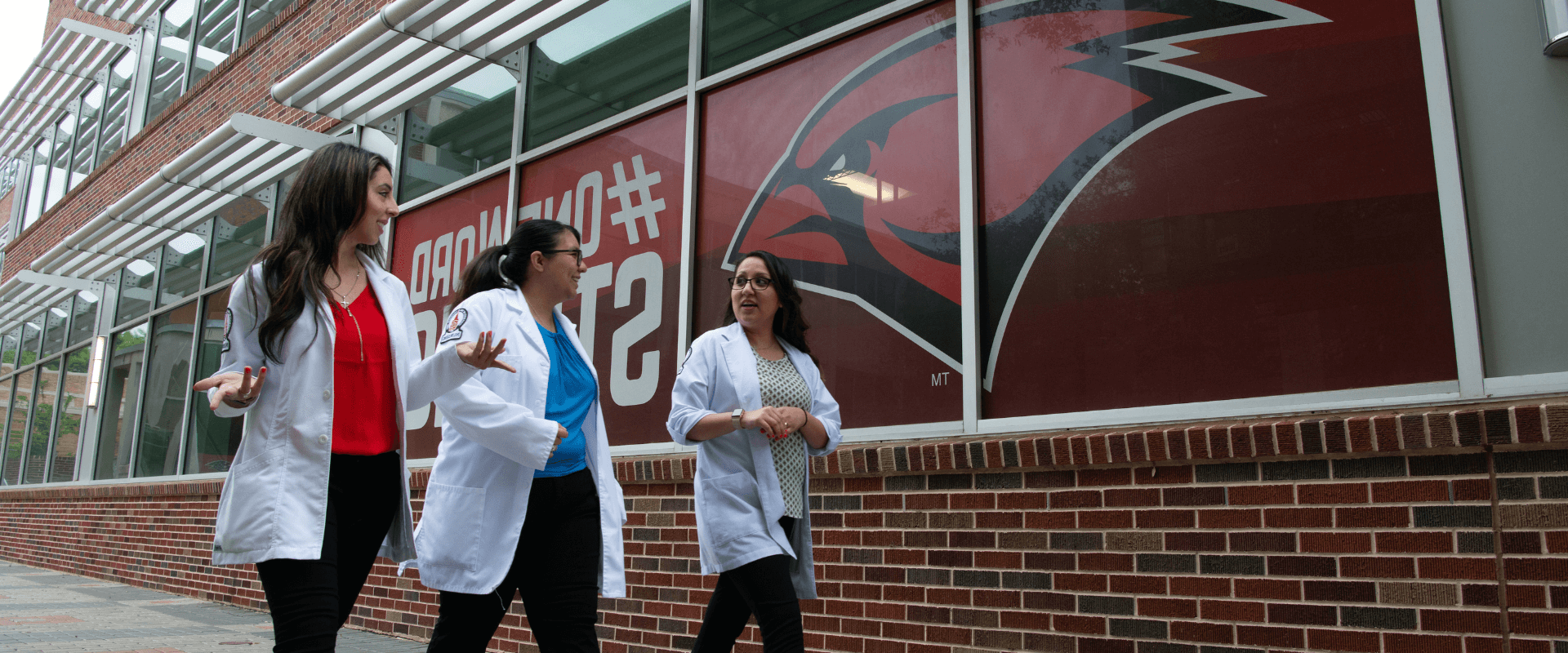 UIW Nursing students working on site with a patient