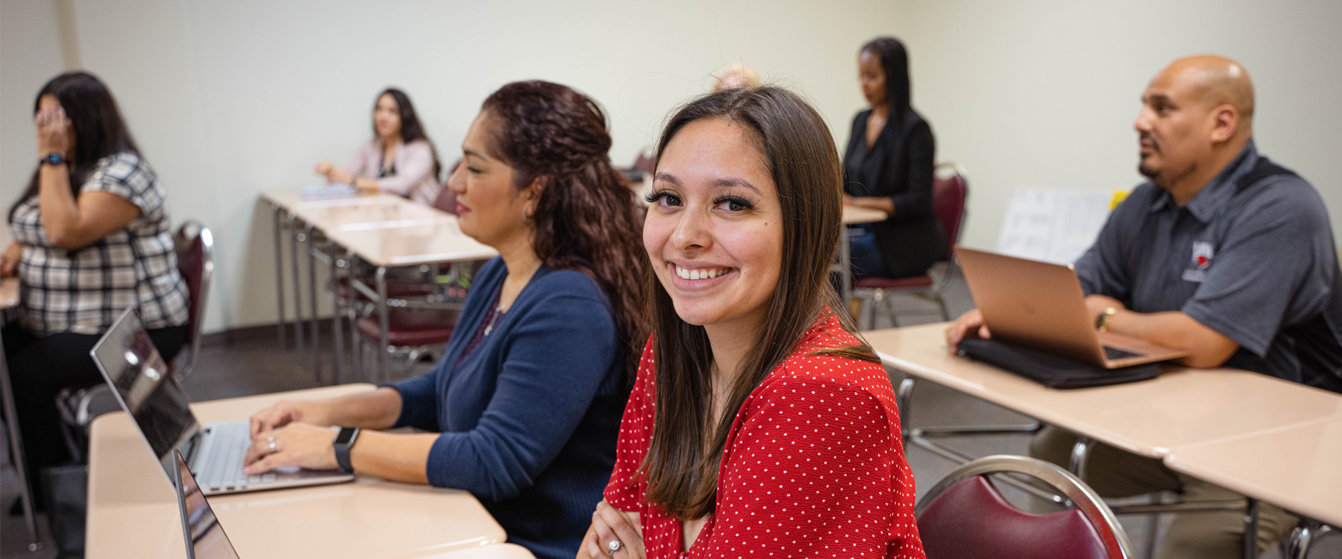 Student smiling in an SPS classroom