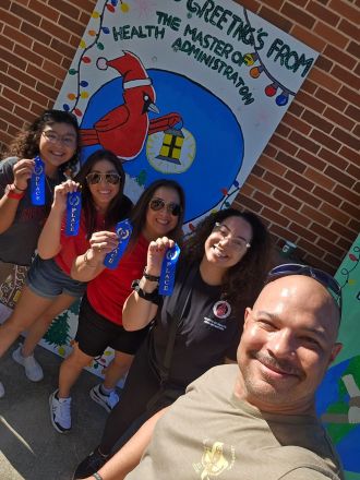 MHA students took first place in Light the Way board painting competition.