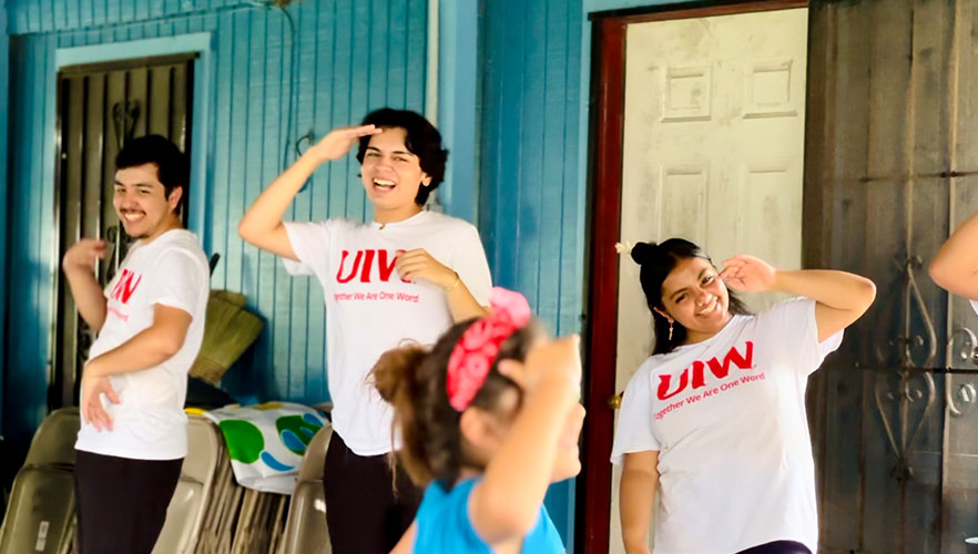 UIW students interacting with kids