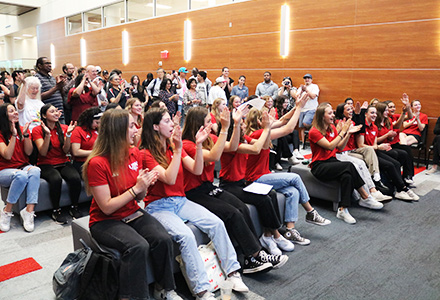 Students sitting at event