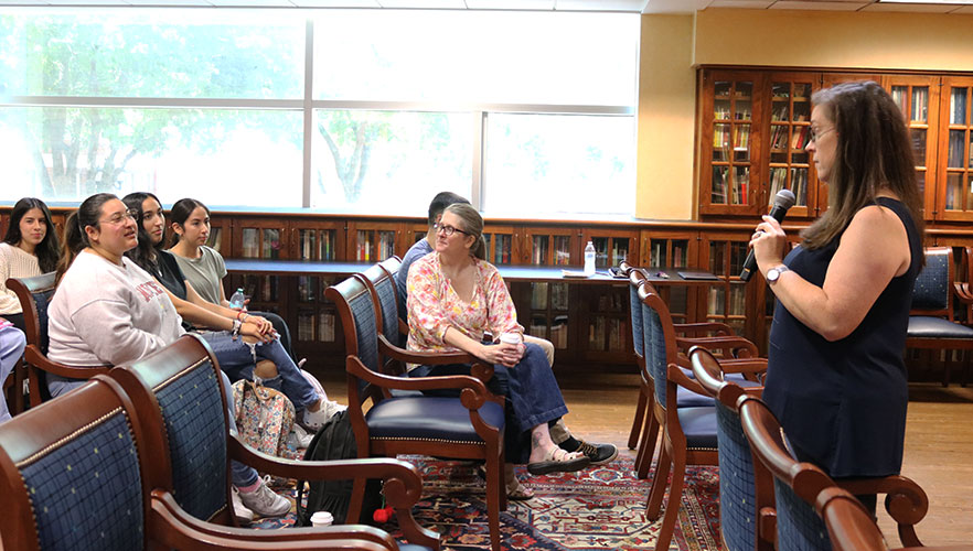 Dr. Ann D. David talking with audience members