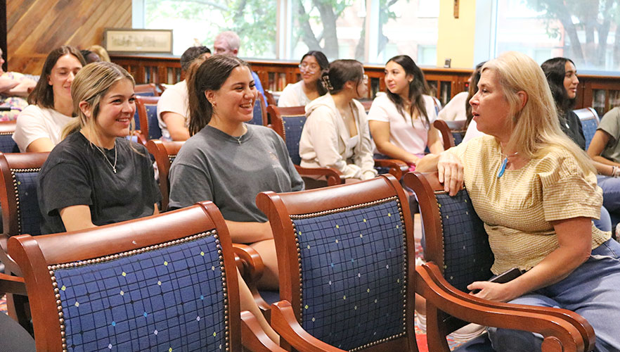 Attendees discussing banned books