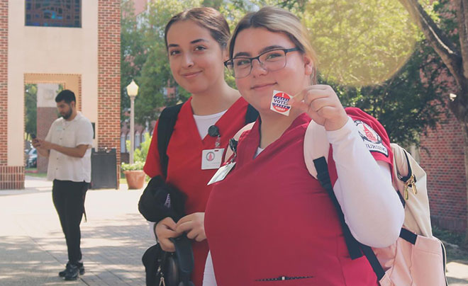 Students with voting sticker