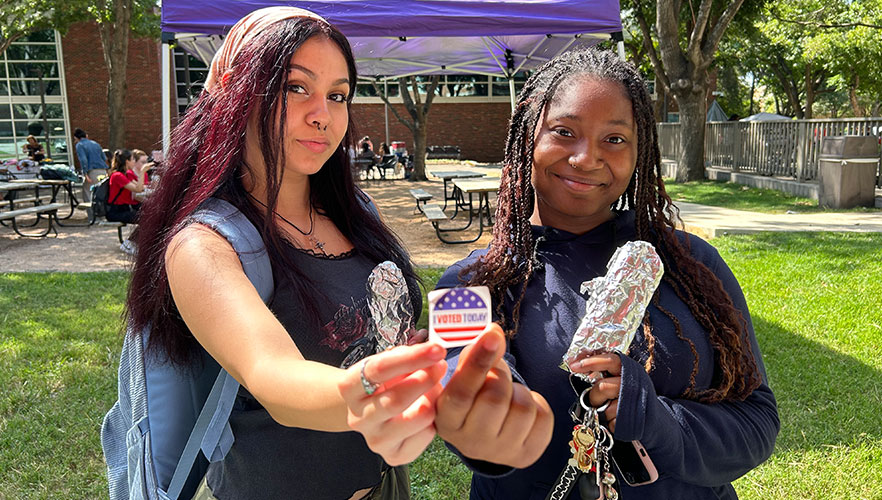 Students with voting sticker