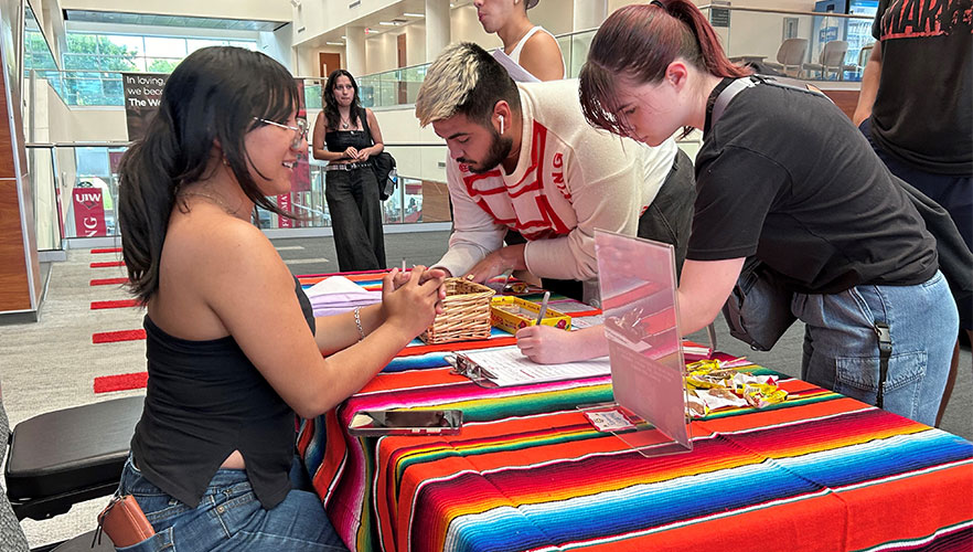 Students signing into event