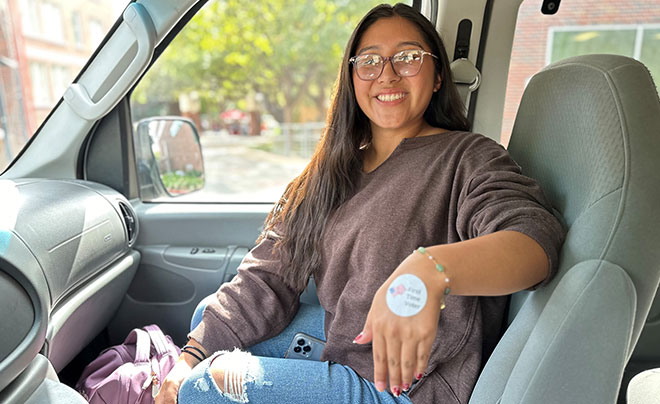 Student with voting sticker