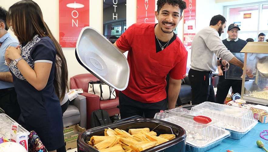 Feik student selling tamales