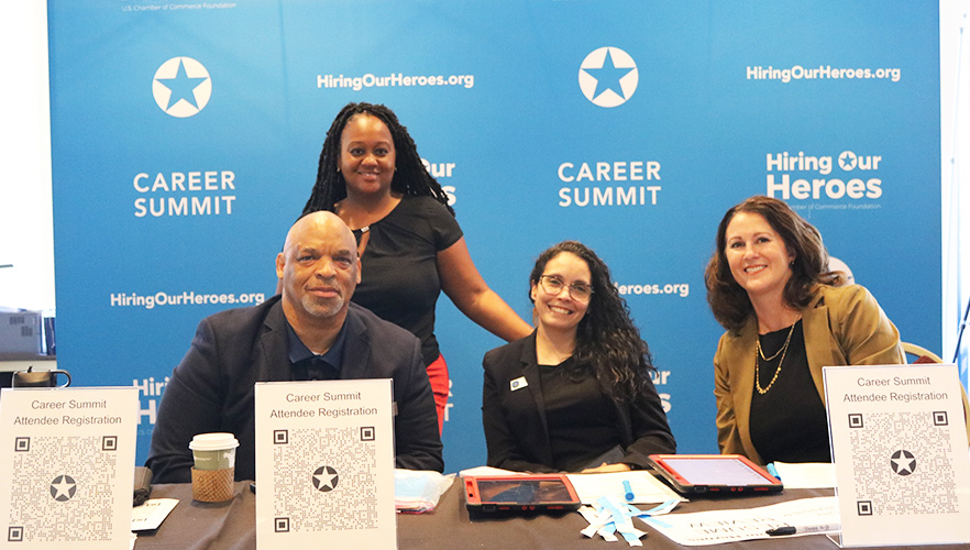 employer booth with four representatives