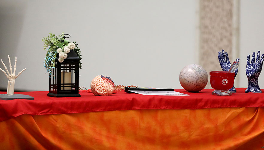 UIW school symbolic objects on table