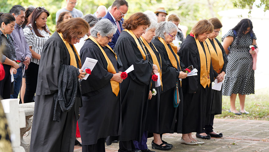 Attendees praying