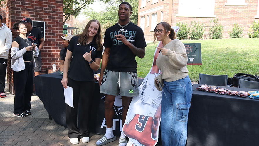 Jalen Walthall with students