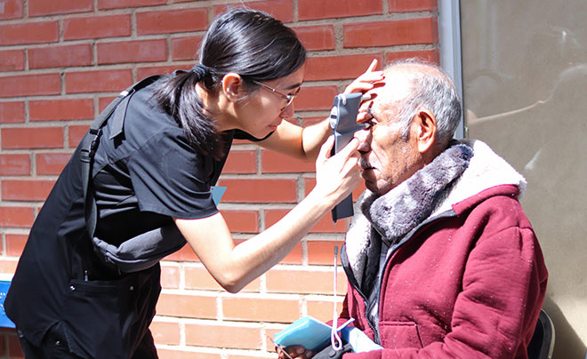 Healthcare personnel evaluating patient's health