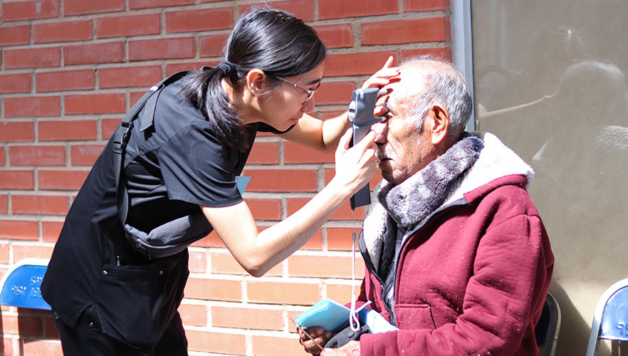 Healthcare personnel evaluating patient's health