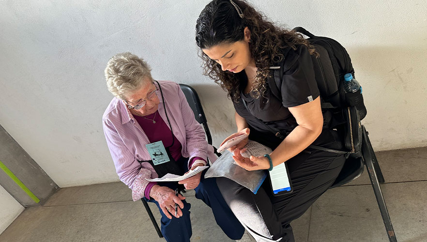 Healthcare personnel evaluating patient's health