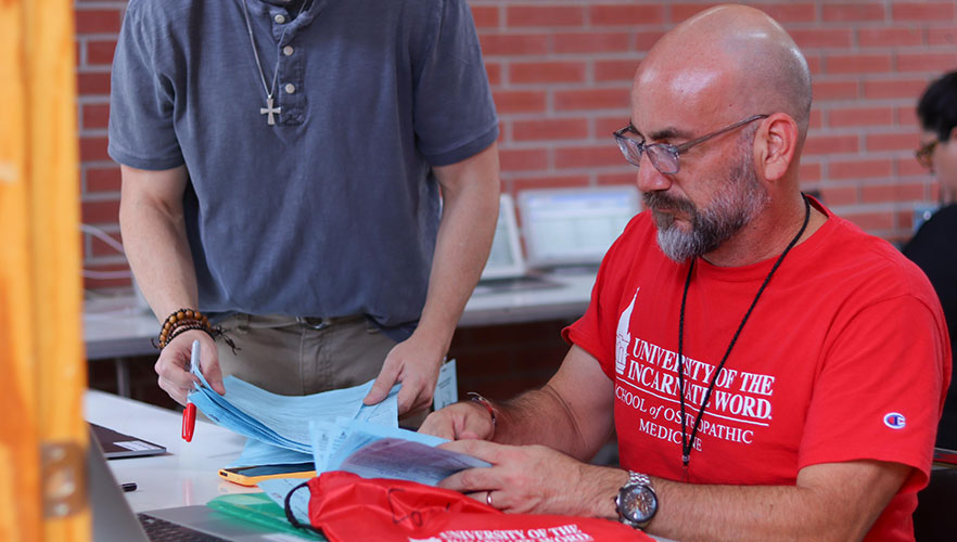 UIWSOM personnel working clinic