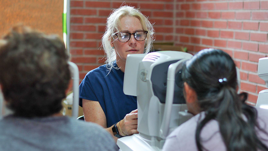 Healthcare personnel evaluating patient's health