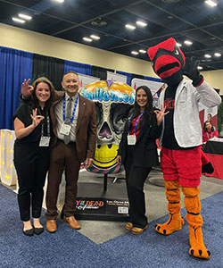 Red the Cardinal at OMED 2024 with Dr. Pham