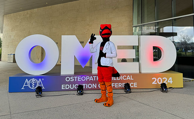 Red the Cardinal at OMED 2024