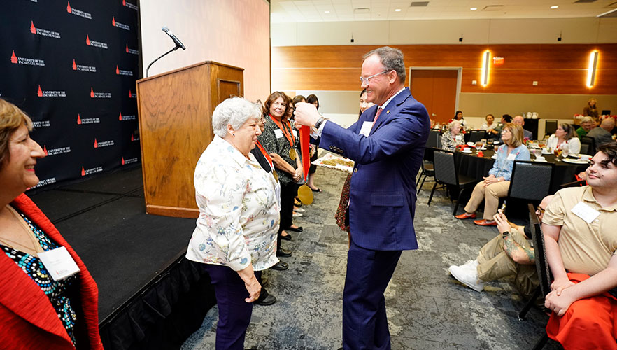 Honorees being welcomed into Golden Spire society