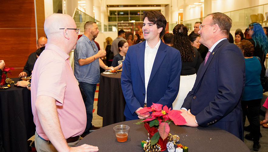 Dr. Evans talking with student