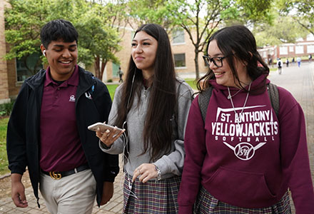 Three SACHS students walking and talking