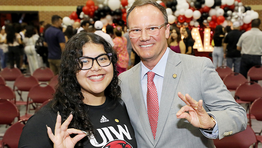 president with a student