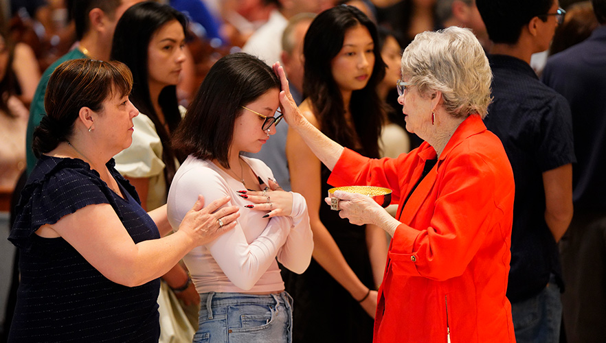 students being blessed