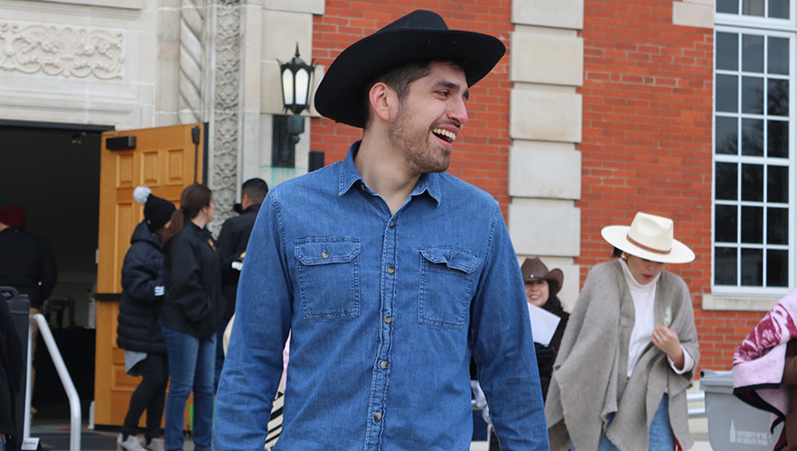 Attendee in western clothes