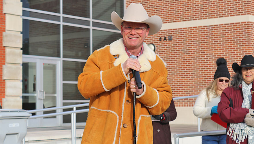 Dr. Evans in western clothes