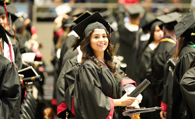 UIW graduate in app and gown
